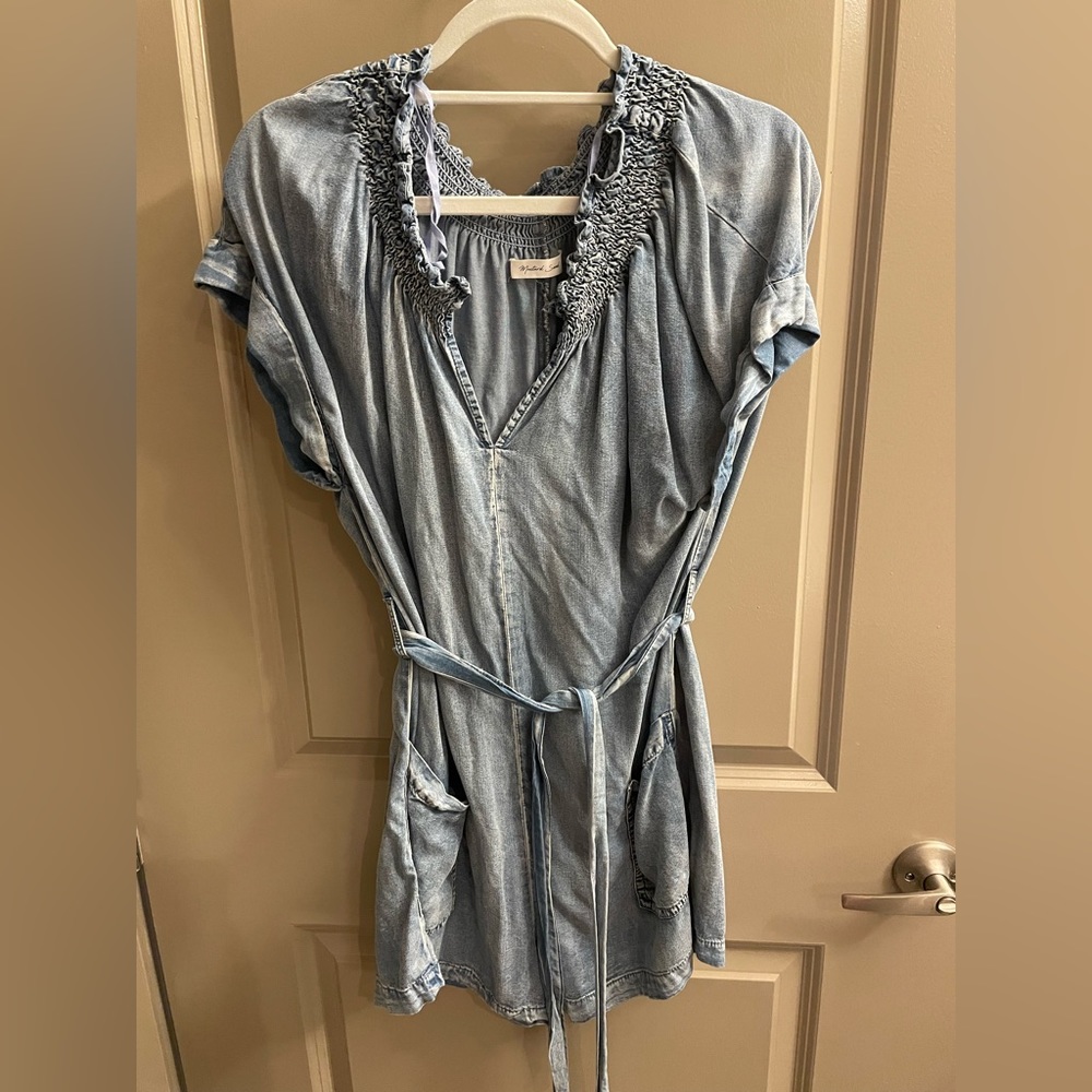 Boutique denim romper with front tie.